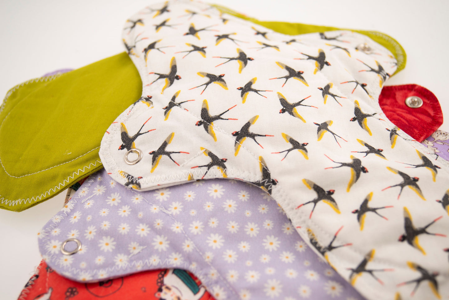 Montón de compresas XL de tela de diferentes colores de Teixint Circles